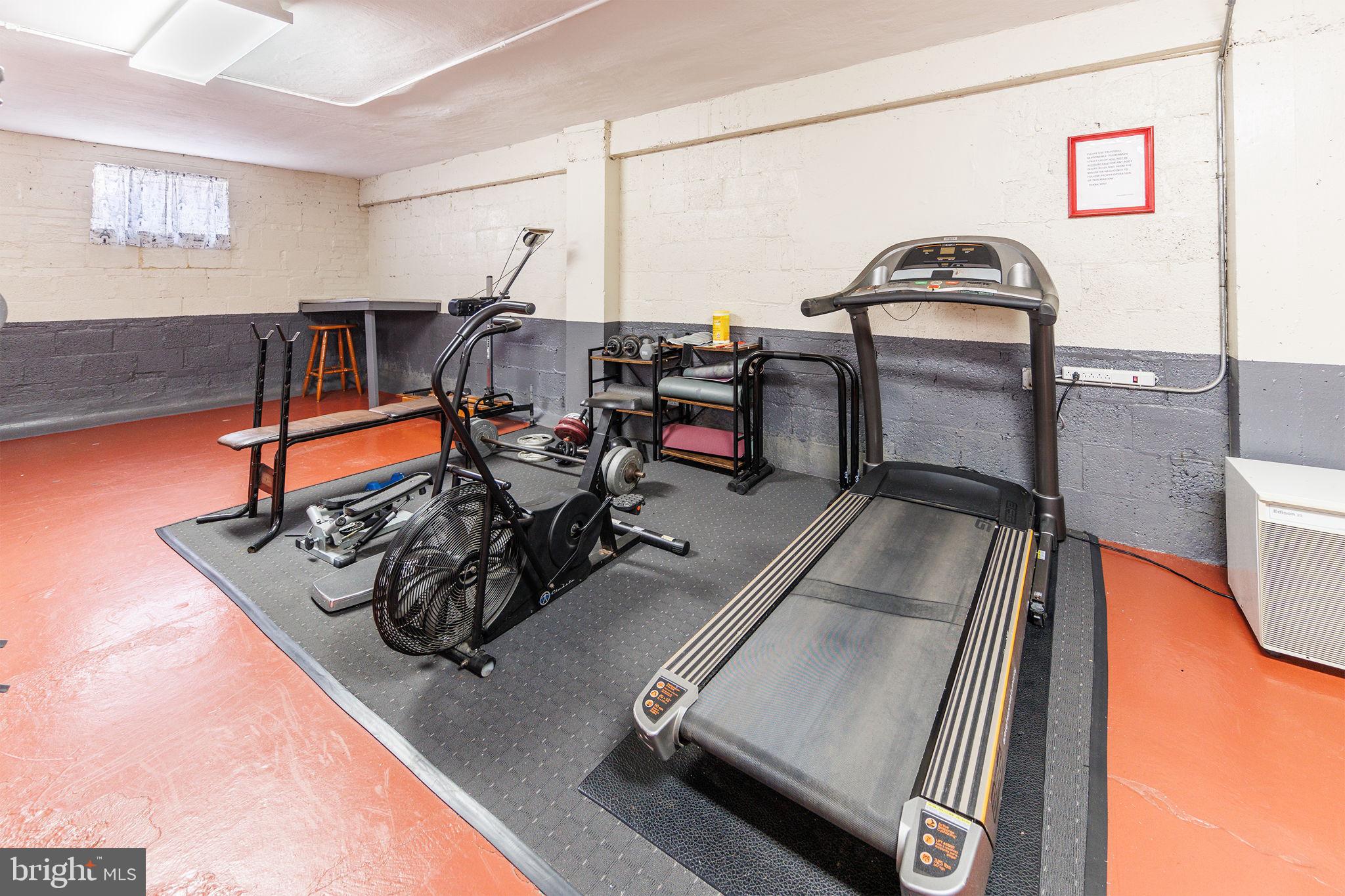 1446 Tuckerman Street Northwest, Unit A6 Washington, DC 20011 - Photo 22 of 25 a room with gym equipment