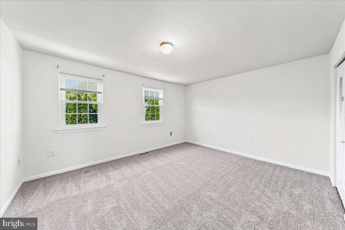 54 Norwood House Road, Unit 34 Downingtown, PA 19335 - Photo 14 of 21 an empty room with windows