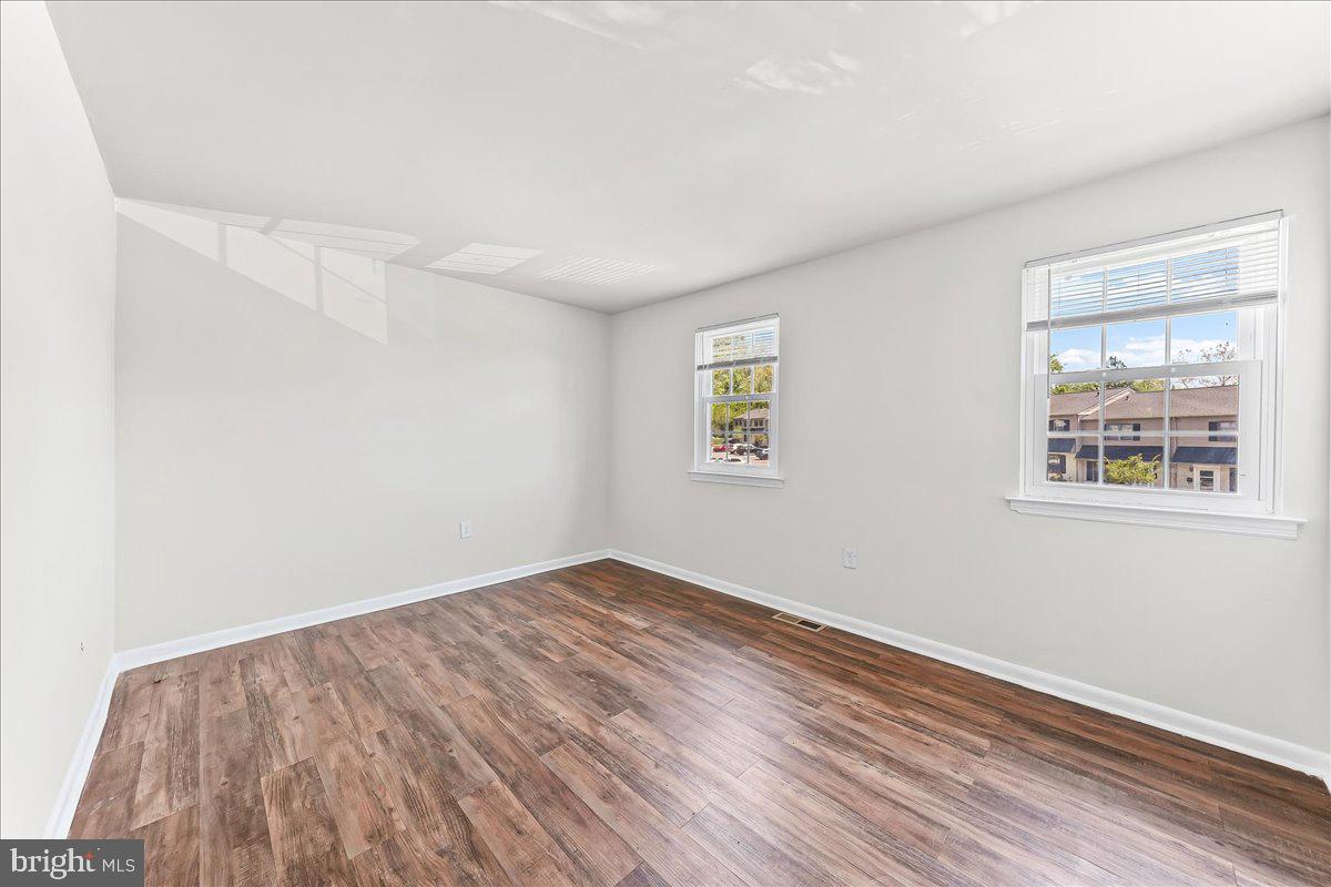 54 Norwood House Road, Unit 34 Downingtown, PA 19335 - Photo 17 of 21 an empty room with windows