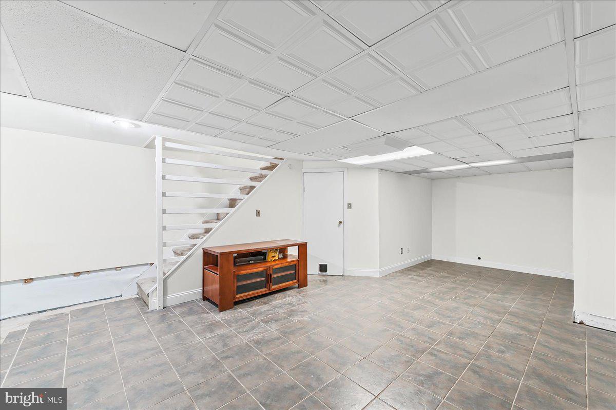54 Norwood House Road, Unit 34 Downingtown, PA 19335 - Photo 20 of 21 a view of a livingroom with an empty space