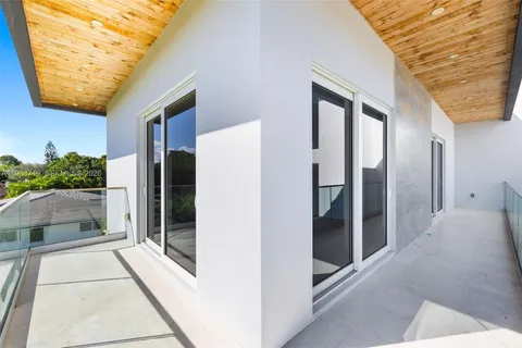 a view of a balcony with an outdoor space