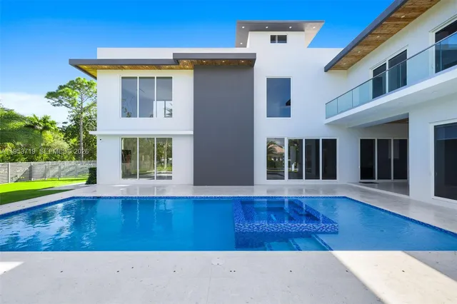 a view of a park with large trees