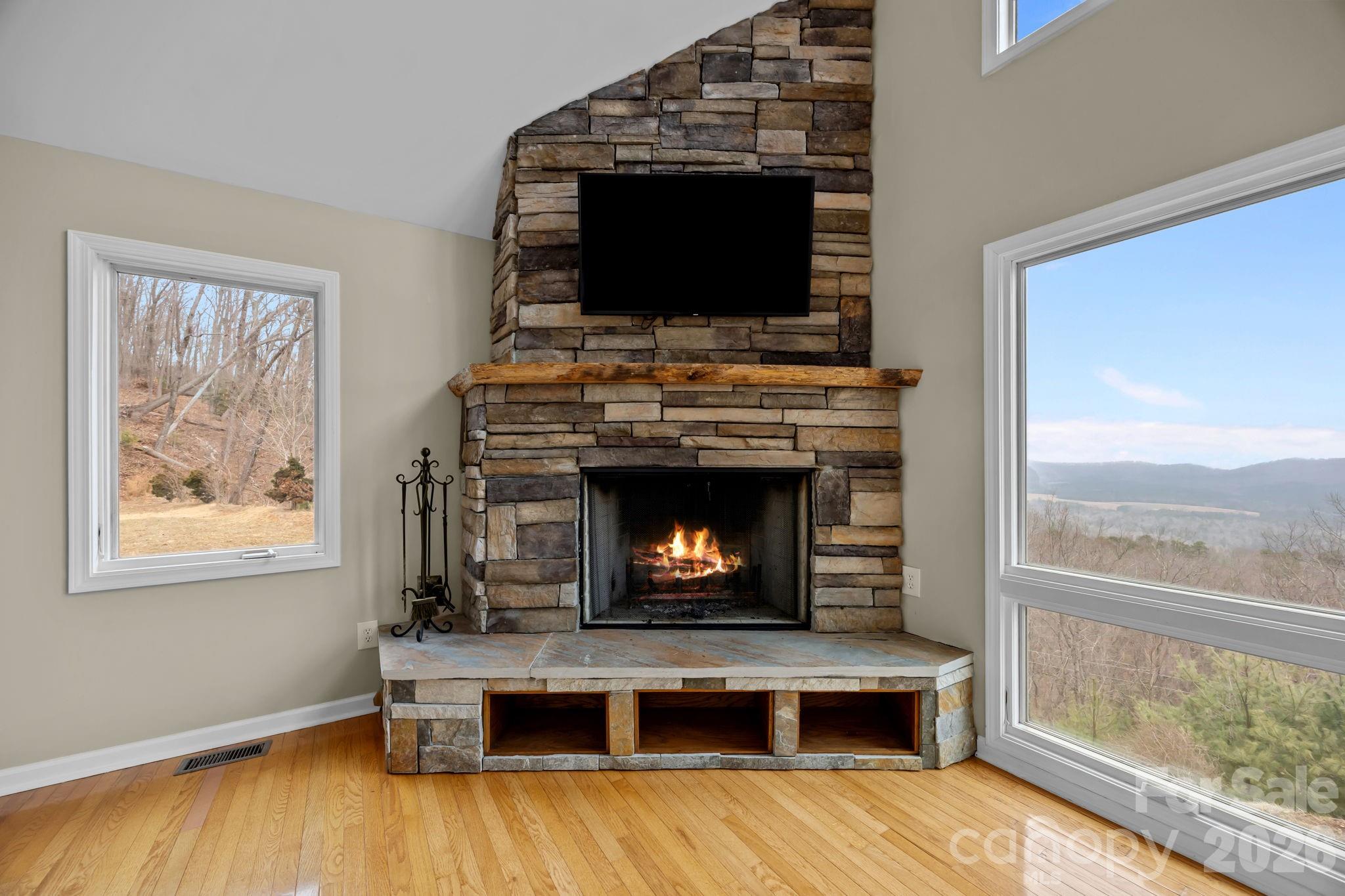 995 Towery Trace Road Ellenboro, NC 28040 - Photo 12 of 40 a living room with furniture and a fireplace