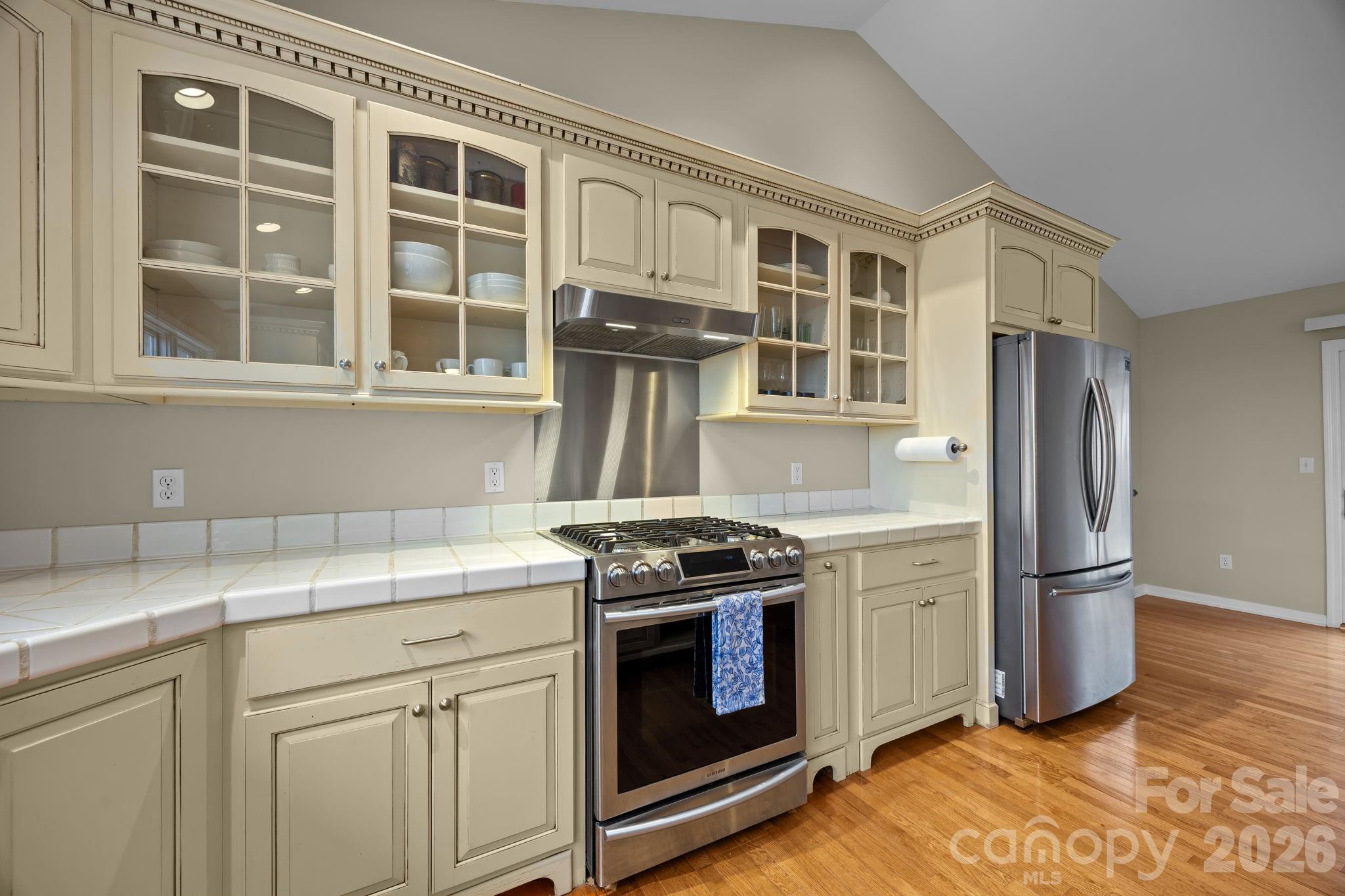995 Towery Trace Road Ellenboro, NC 28040 - Photo 20 of 40 a kitchen with stainless steel appliances granite countertop a stove and a refrigerator