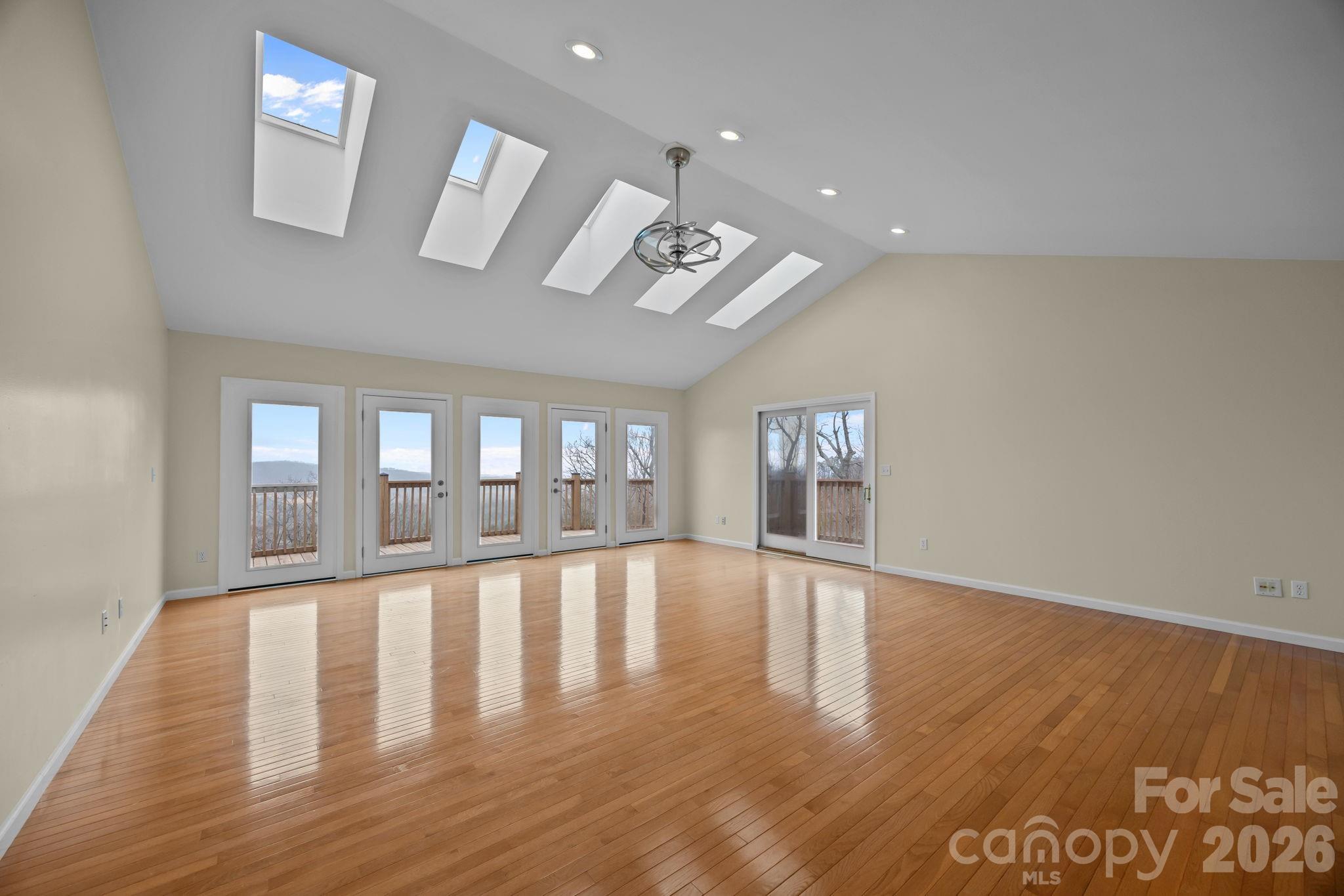 995 Towery Trace Road Ellenboro, NC 28040 - Photo 23 of 40 wooden floor in an empty room with a window