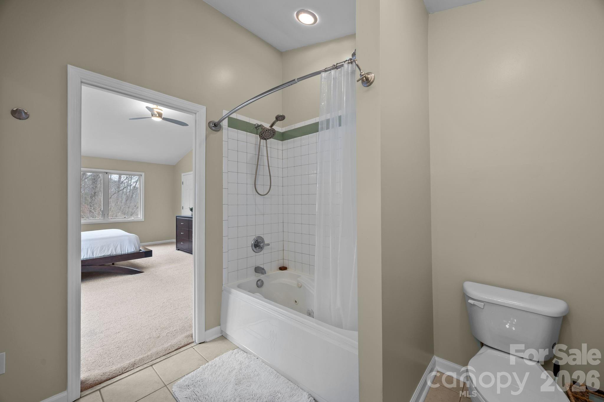995 Towery Trace Road Ellenboro, NC 28040 - Photo 31 of 40 a bathroom with a tub shower sink and toilet