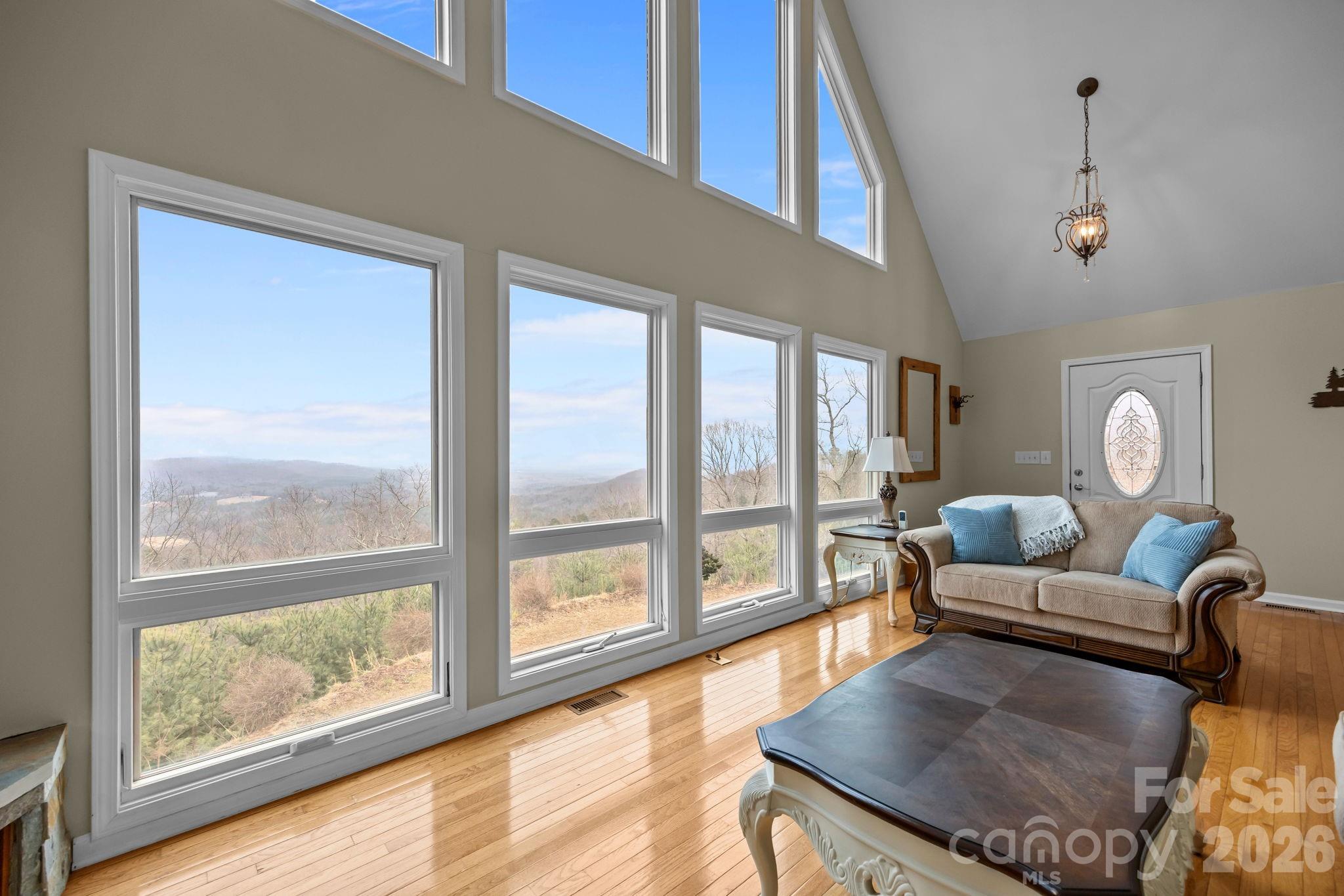 995 Towery Trace Road Ellenboro, NC 28040 - Photo 10 of 40 a living room with furniture and a large window