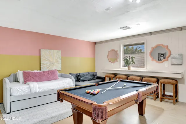 a living room with furniture and window
