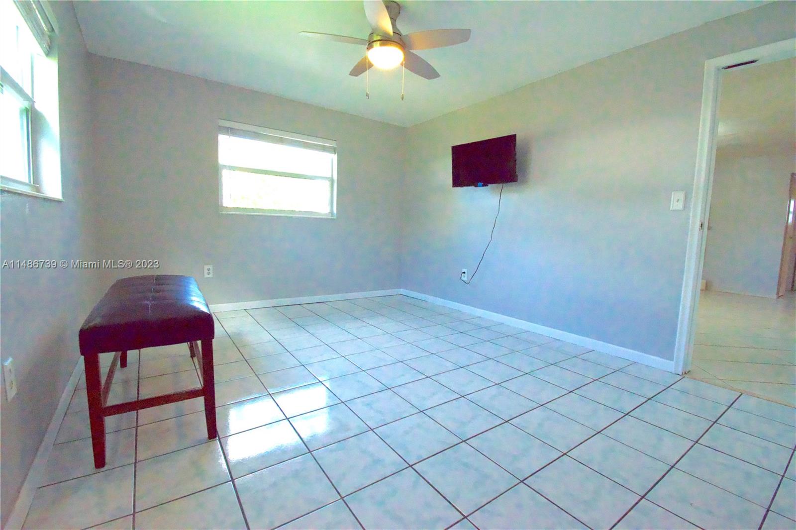 6560 Northwest 30th Street Sunrise, FL 33313 - Photo 15 of 46 a view of a room with a workspace