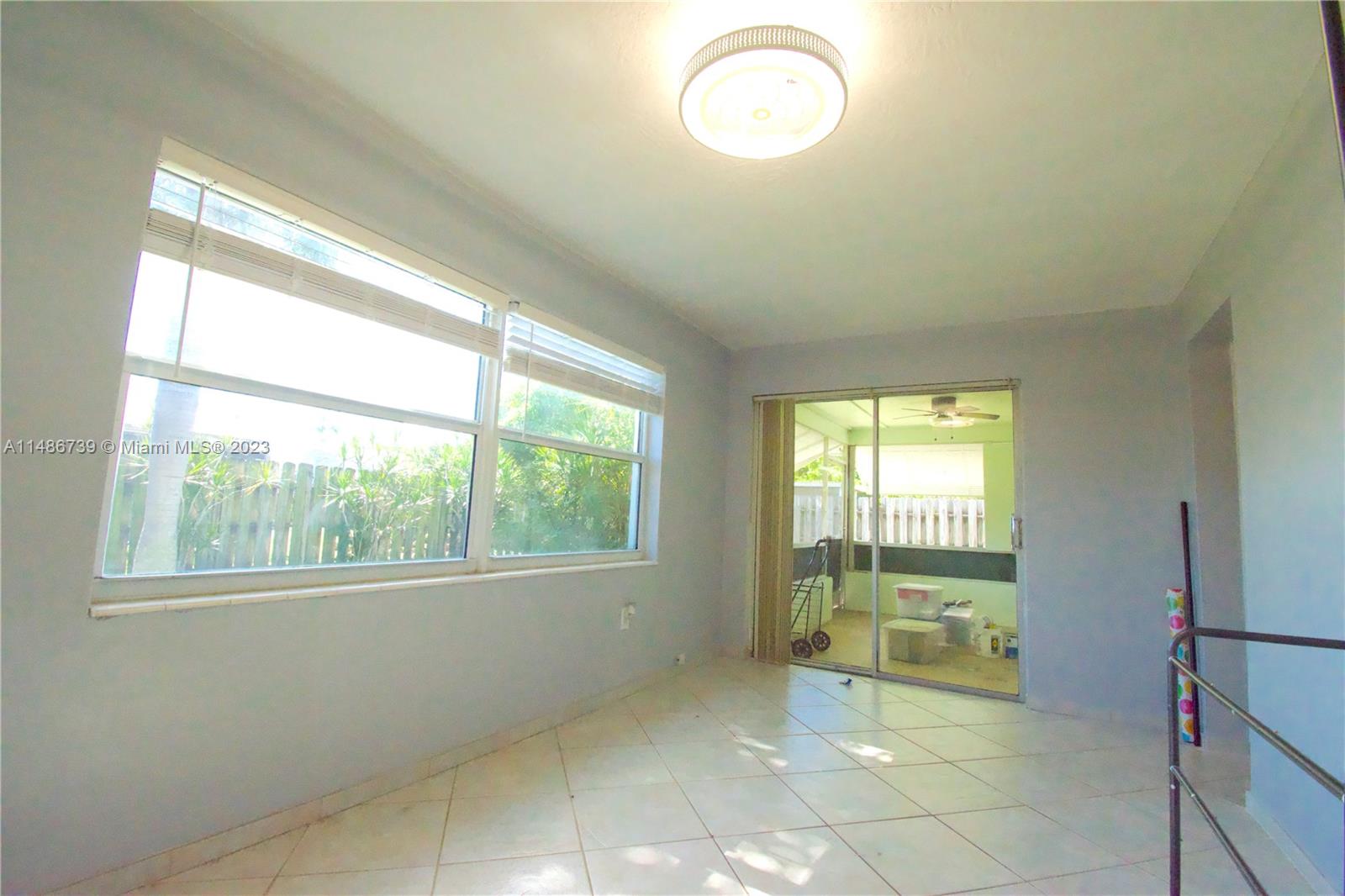 6560 Northwest 30th Street Sunrise, FL 33313 - Photo 31 of 46 a view of an empty room and window