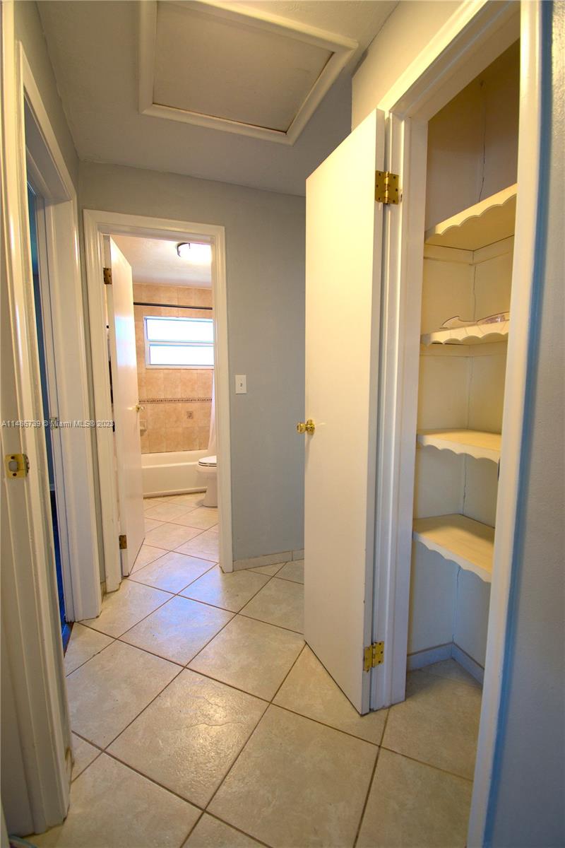 6560 Northwest 30th Street Sunrise, FL 33313 - Photo 32 of 46 a bathroom with a shower and a sink
