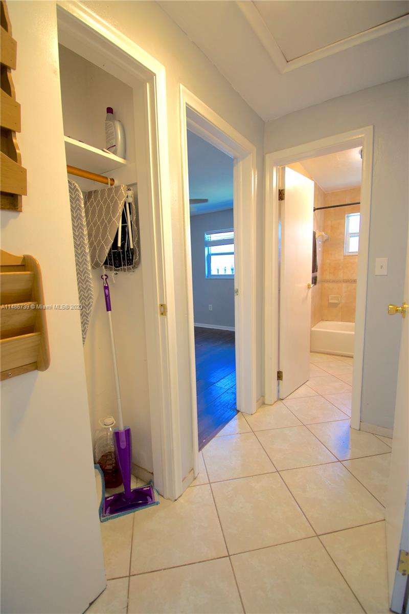 6560 Northwest 30th Street Sunrise, FL 33313 - Photo 33 of 46 a view of a hallway and interior of a house