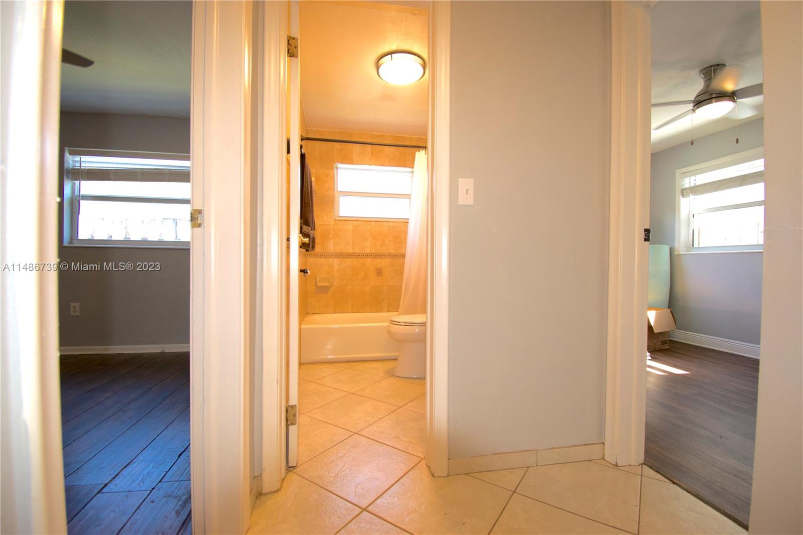 6560 Northwest 30th Street Sunrise, FL 33313 - Photo 34 of 46 a view of a bathroom with a glass door