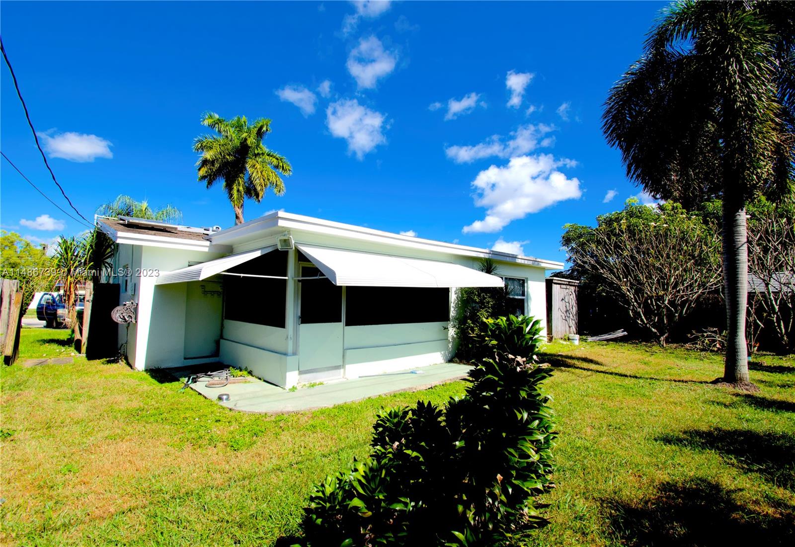 6560 Northwest 30th Street Sunrise, FL 33313 - Photo 4 of 46 a view of a house with a backyard