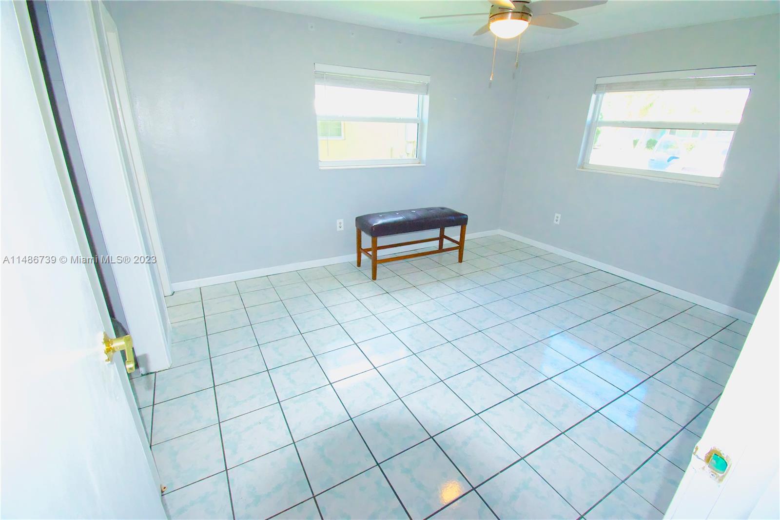 6560 Northwest 30th Street Sunrise, FL 33313 - Photo 10 of 46 a view of an empty room and window