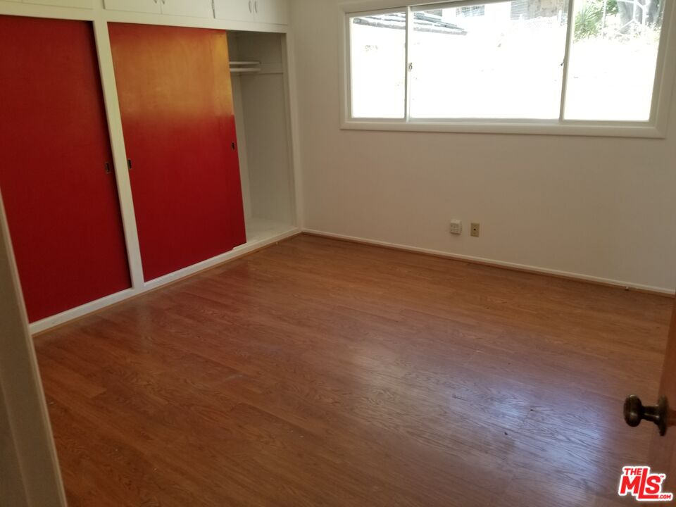 20490 Seaboard Road Malibu, CA 90265 - Photo 34 of 50 an empty room with a window