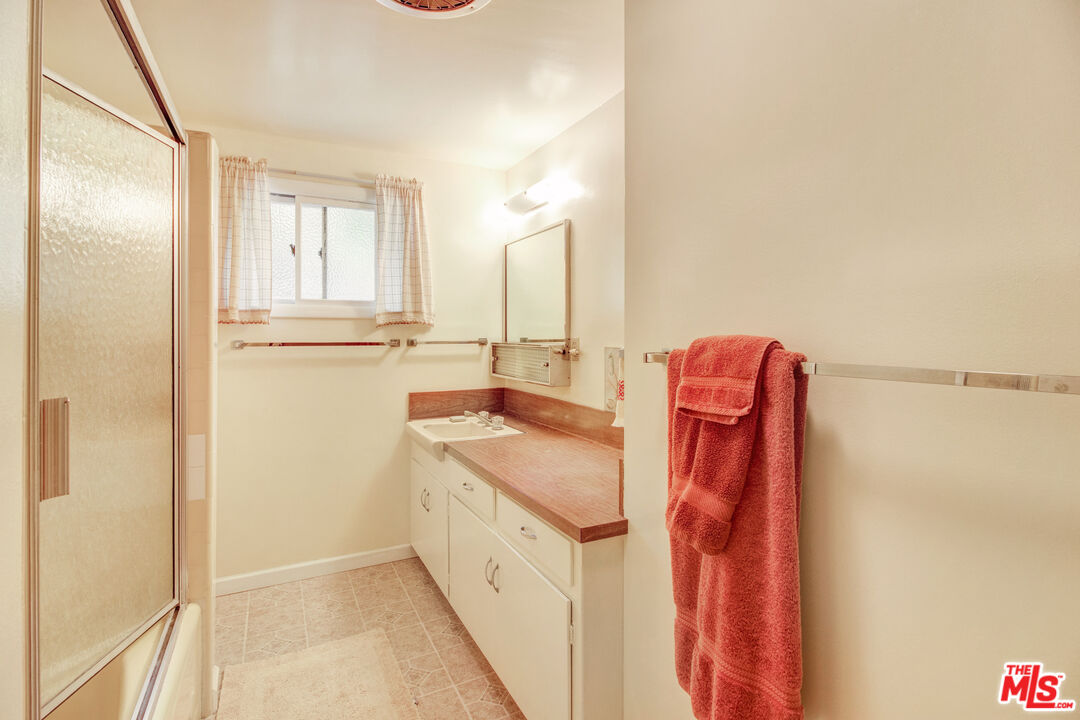 20490 Seaboard Road Malibu, CA 90265 - Photo 35 of 50 a utility room with dryer and washer