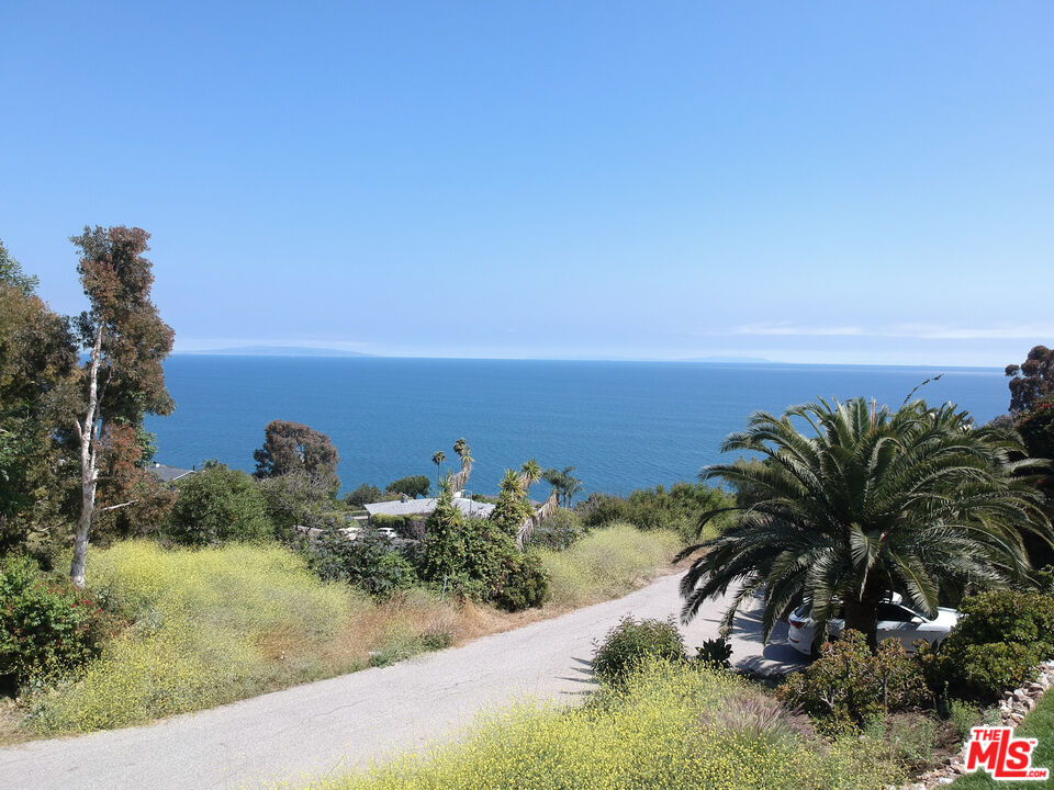 20490 Seaboard Road Malibu, CA 90265 - Photo 41 of 50 a view of a houses with a lake
