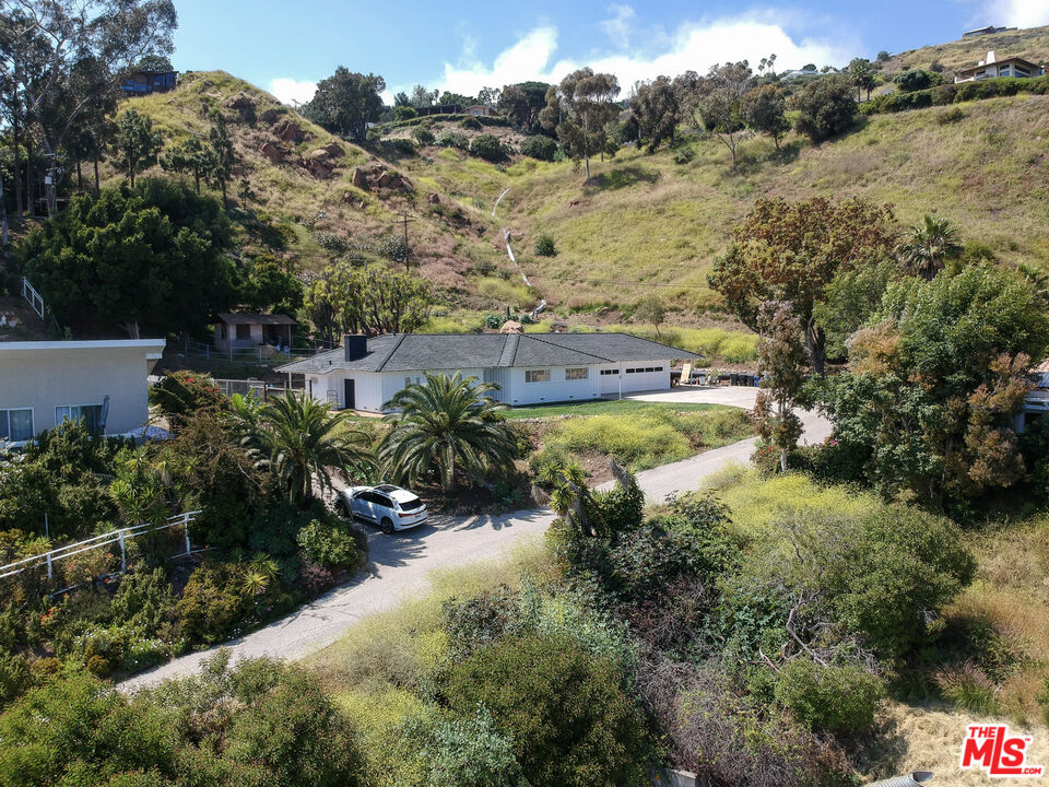 20490 Seaboard Road Malibu, CA 90265 - Photo 42 of 50 a view of a lake with mountains in the back