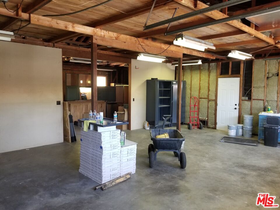 20490 Seaboard Road Malibu, CA 90265 - Photo 46 of 50 a living room with furniture and a table