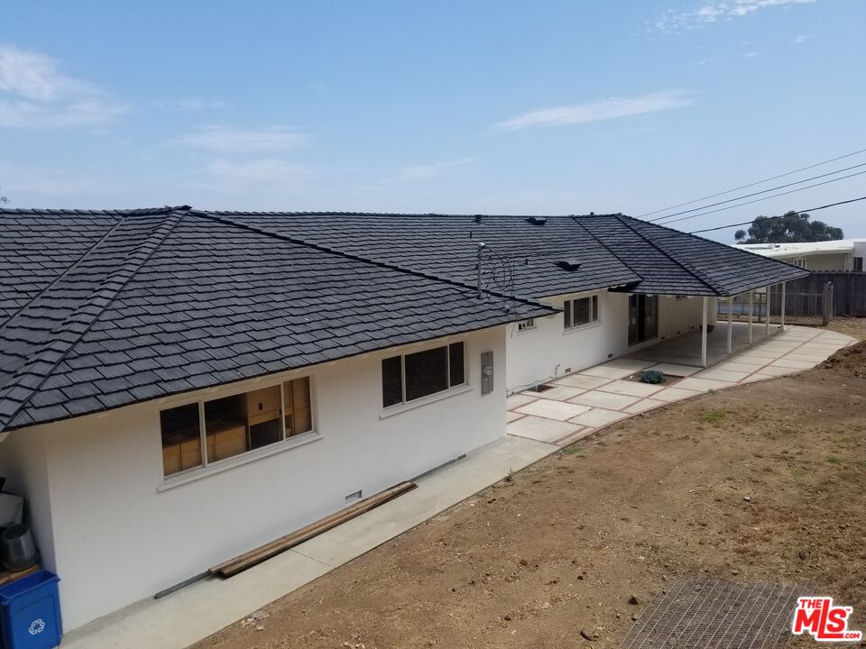 20490 Seaboard Road Malibu, CA 90265 - Photo 49 of 50 a view of a house with a roof deck