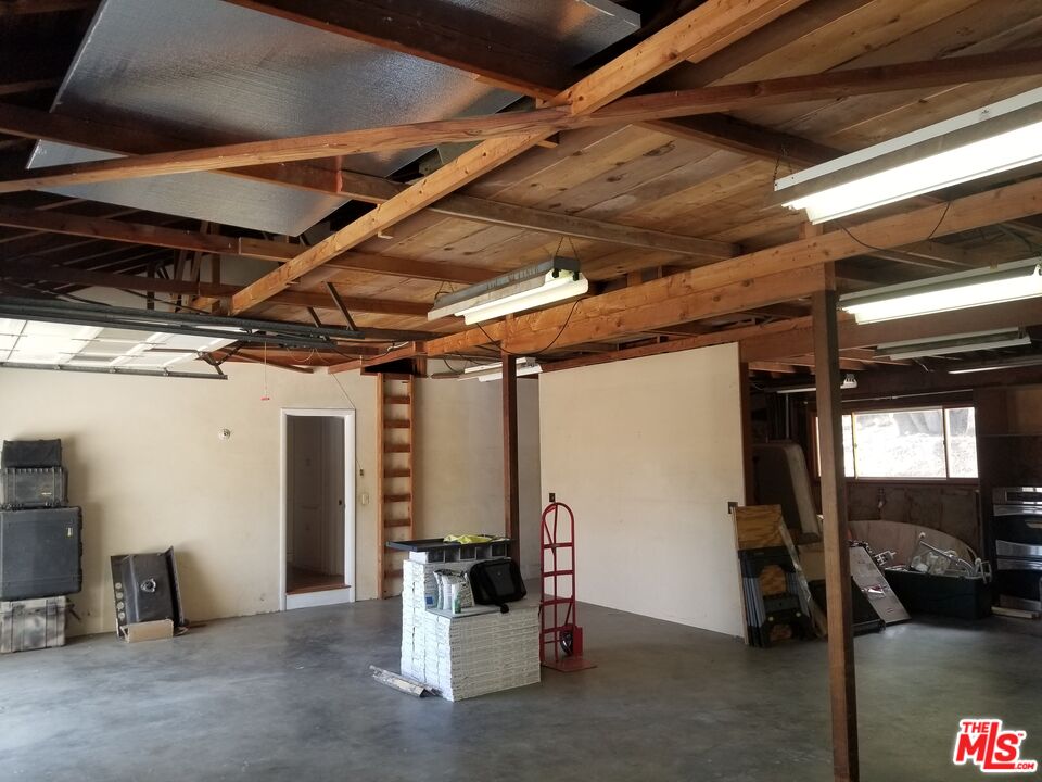 20490 Seaboard Road Malibu, CA 90265 - Photo 50 of 50 a view of work room with stairs