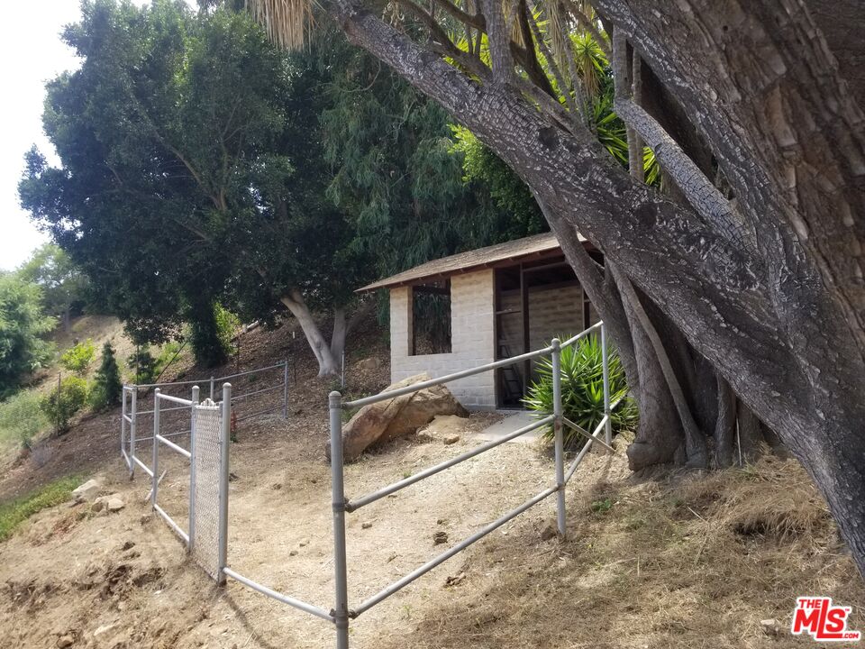 20490 Seaboard Road Malibu, CA 90265 - Photo 10 of 50 a view of a house with a yard
