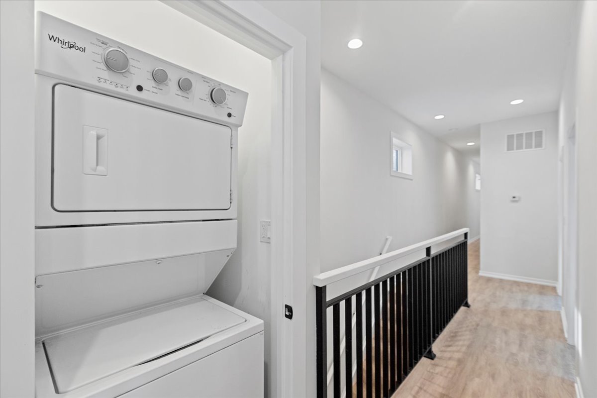 5201 South Wabash Avenue, Unit 3 Chicago, IL 60615 - Photo 11 of 11 a view of washer and dryer with bathroom in the background