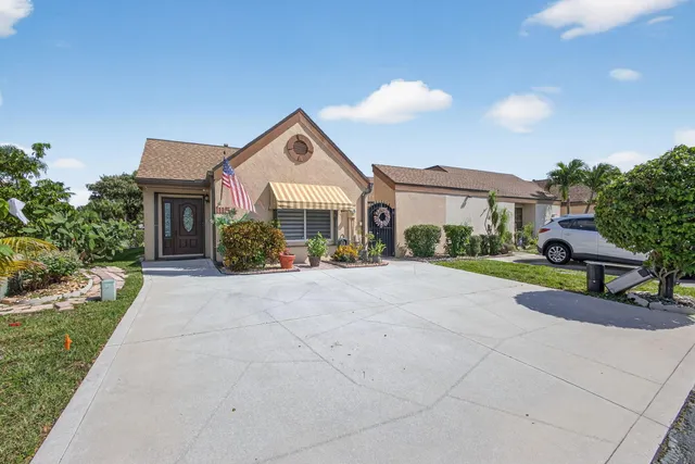 $479,900 | 11154 Curry Drive, Palm Beach Gardens, FL 33418