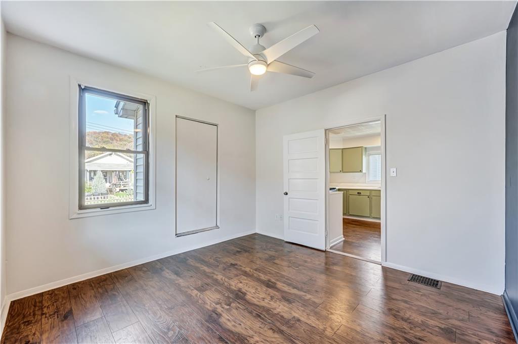5504 Jane Pittsburgh, PA 15225 - Photo 13 of 27 wooden floor in an empty room with a window