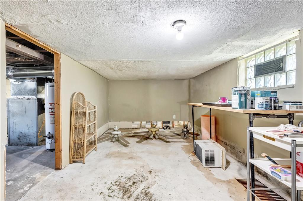 5504 Jane Pittsburgh, PA 15225 - Photo 18 of 27 a room with storage and utility