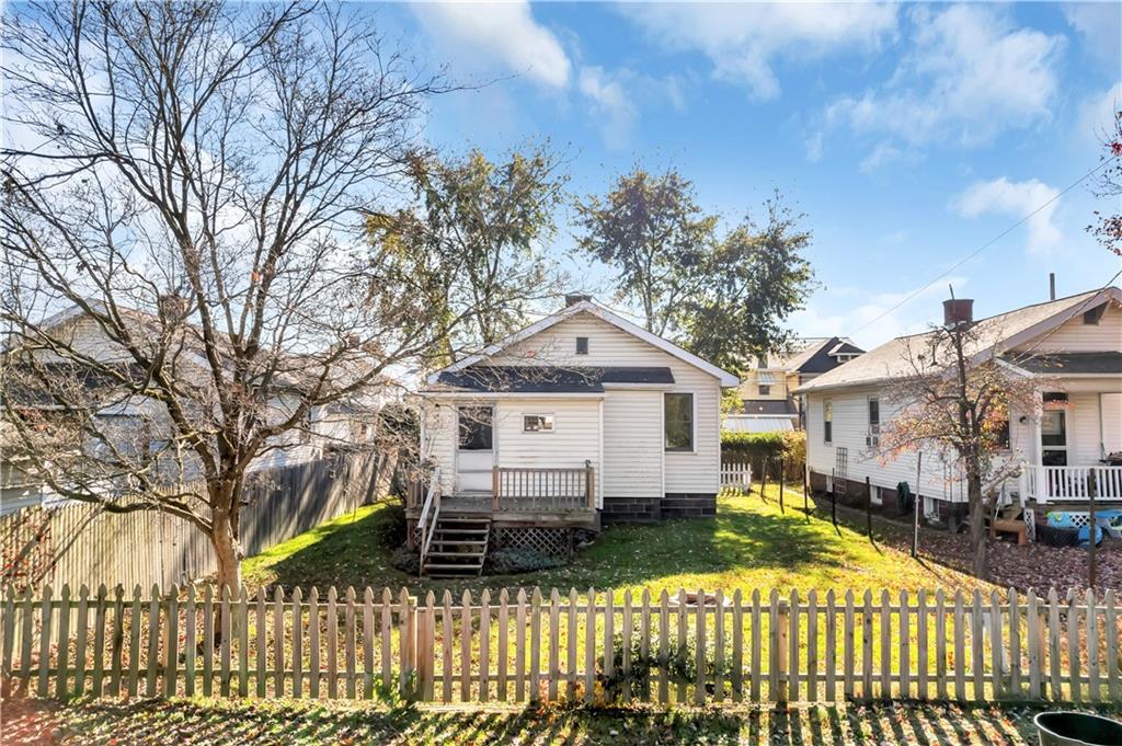 5504 Jane Pittsburgh, PA 15225 - Photo 23 of 27 a house that has a tree in front of it