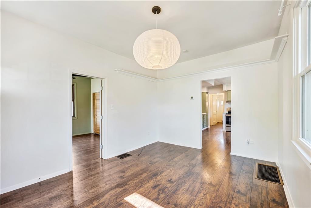 5504 Jane Pittsburgh, PA 15225 - Photo 3 of 27 wooden floor in an empty room with a window