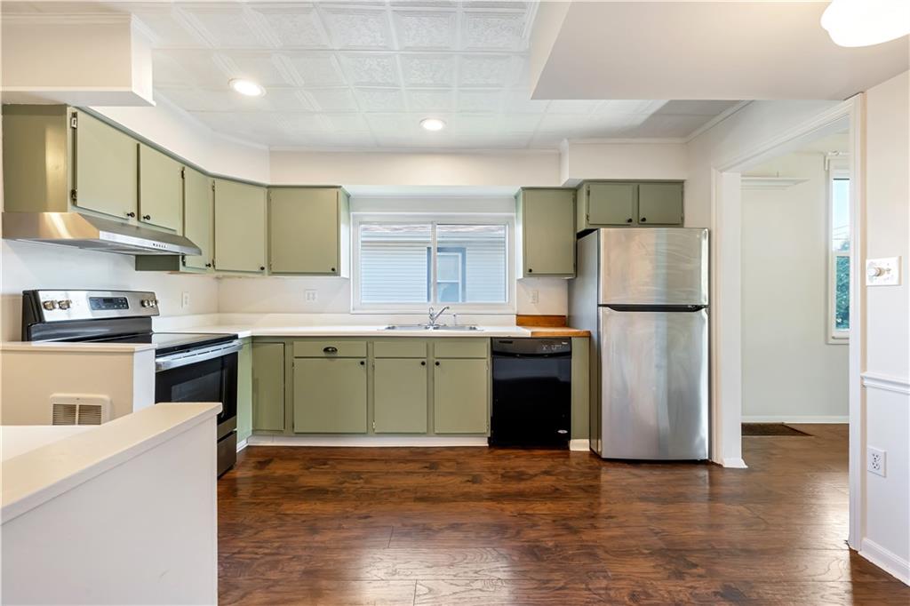 5504 Jane Pittsburgh, PA 15225 - Photo 9 of 27 a kitchen with a refrigerator and a stove top oven