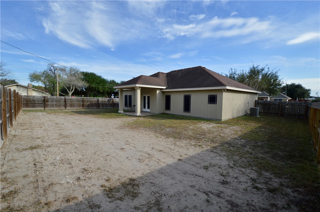 1717 Agarito Avenue Alice, TX 78332 - Photo 25 of 25 a front view of a house with a garden