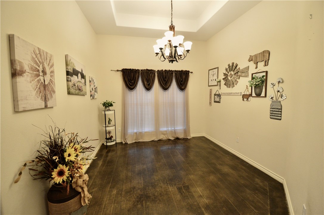 1717 Agarito Avenue Alice, TX 78332 - Photo 6 of 25 a view of a chandelier in a room