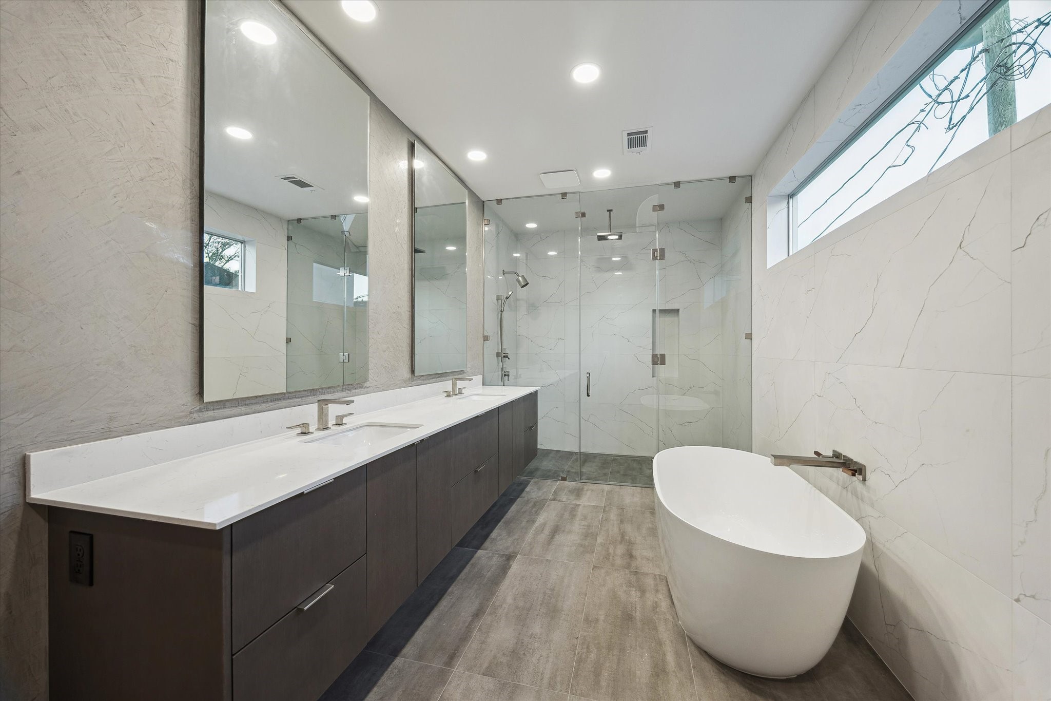 2129 Quenby Street Houston, TX 77005 - Photo 29 of 39 a bathroom with a double vanity sink mirror and toilet