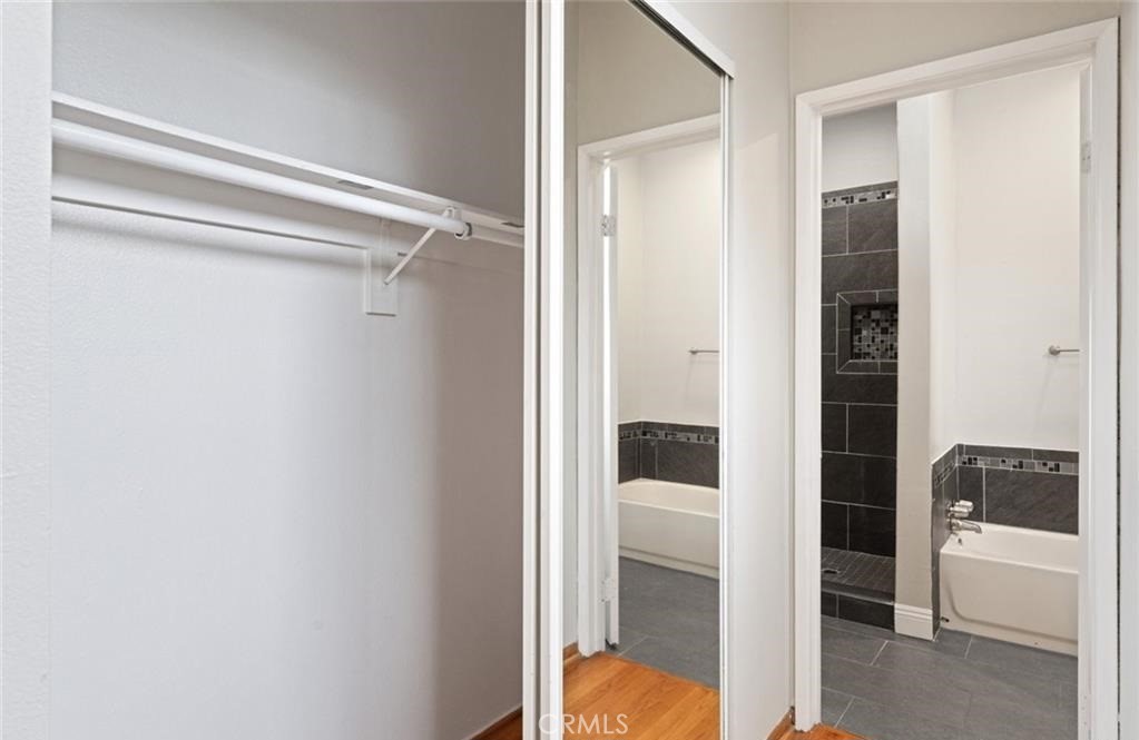 4705 Kester Avenue, Unit 209 Sherman Oaks, CA 91403 - Photo 15 of 18 a bathroom with a tub and shower