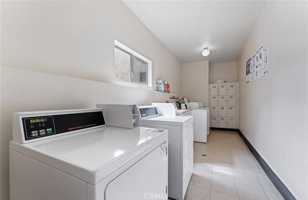 4705 Kester Avenue, Unit 209 Sherman Oaks, CA 91403 - Photo 18 of 18 a utility room with dryer and washer