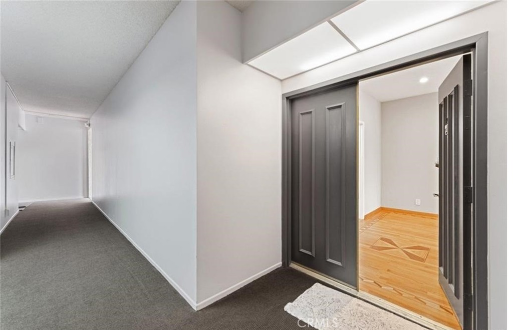 4705 Kester Avenue, Unit 209 Sherman Oaks, CA 91403 - Photo 5 of 18 a view of hallway with closet