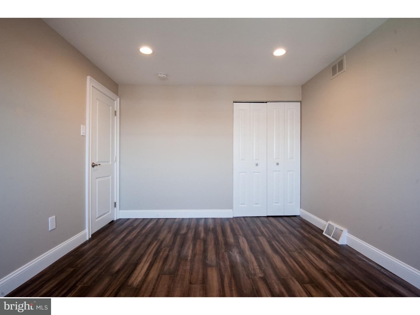 3302 Gurley Road Philadelphia, PA 19154 - Photo 20 of 25 a view of an empty room with wooden floor