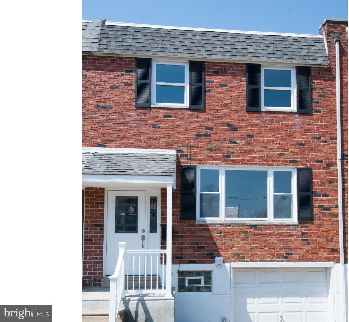 3302 Gurley Road Philadelphia, PA 19154 - Photo 24 of 25 a view of front of a brick house with many windows