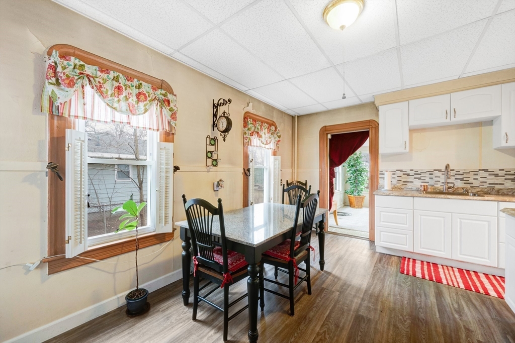 62 Fargo Street Springfield, MA 01119 - Photo 11 of 38 a dining room with furniture window wooden floor