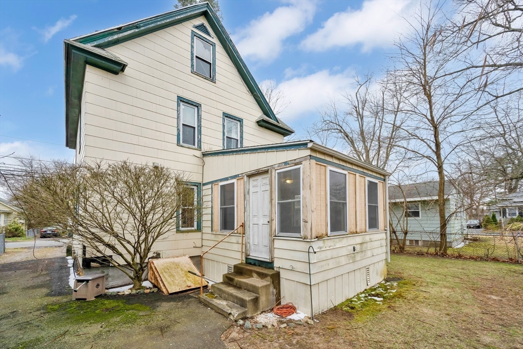 62 Fargo Street Springfield, MA 01119 - Photo 6 of 38 a front view of a house with a large tree