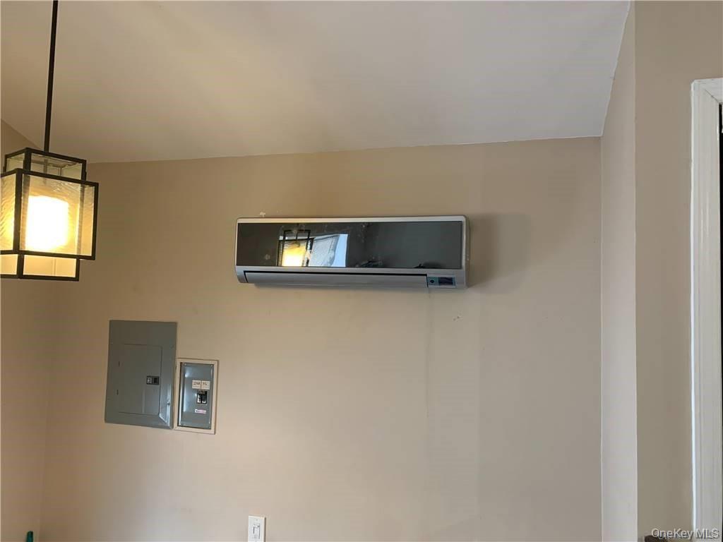 137-33 158th Street Queens, NY 11434 - Photo 6 of 21 a picture of a wall with a tv