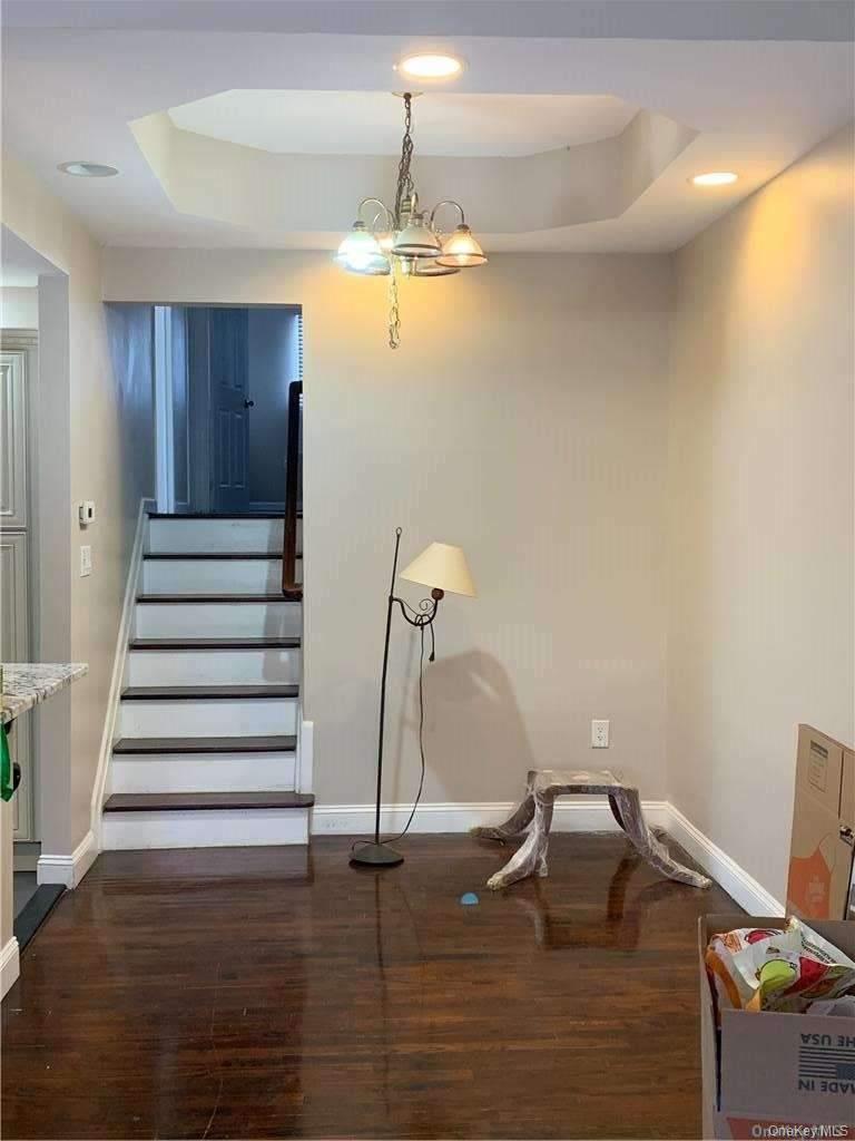 137-33 158th Street Queens, NY 11434 - Photo 7 of 21 a view of entryway and hall with wooden floor