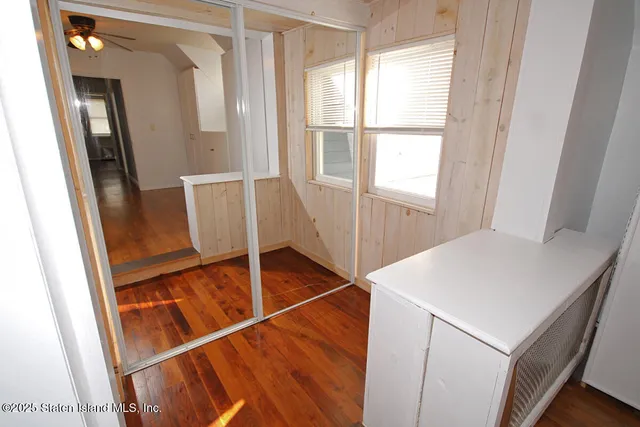 a view of walk in closet with window