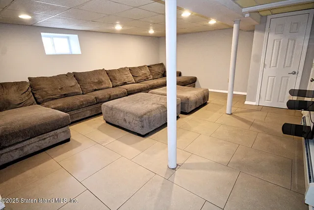 a close view of a sink a vanity and a mirror