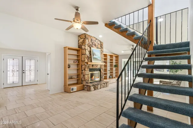 a living room with furniture and a window