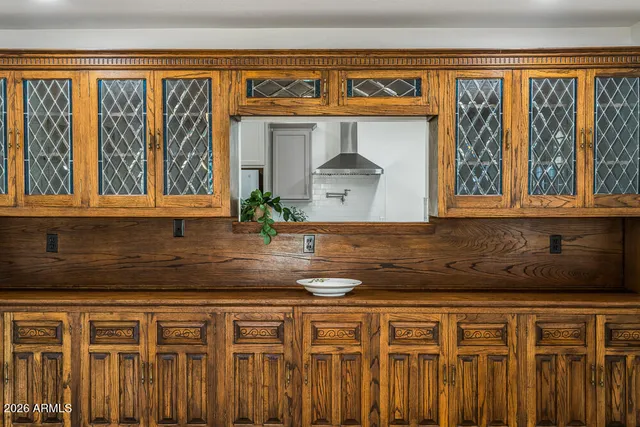 a kitchen with stainless steel appliances granite countertop a refrigerator a sink and dishwasher